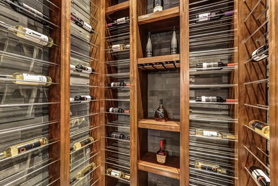 Custom wine cellar with organized bottle storage in a luxury home