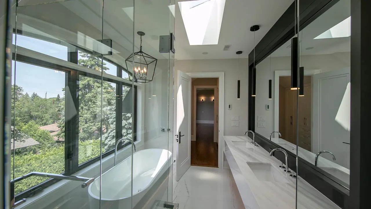 Bathroom with a freestanding tub in an Odima Construction residential project
